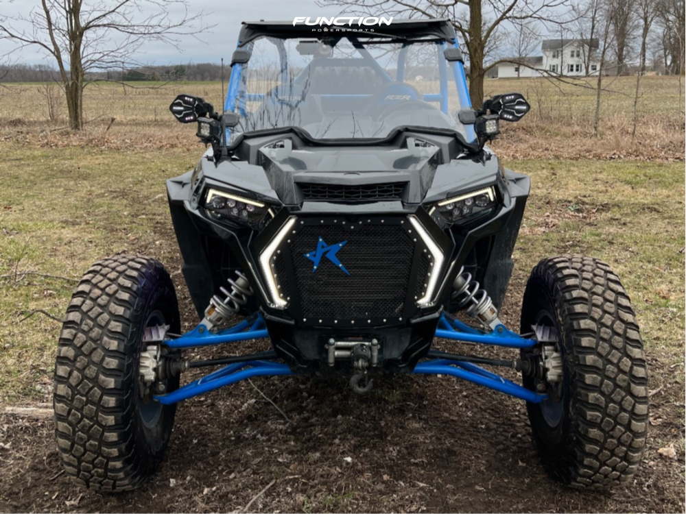 front view of polaris rzr with engine and cockpit shown